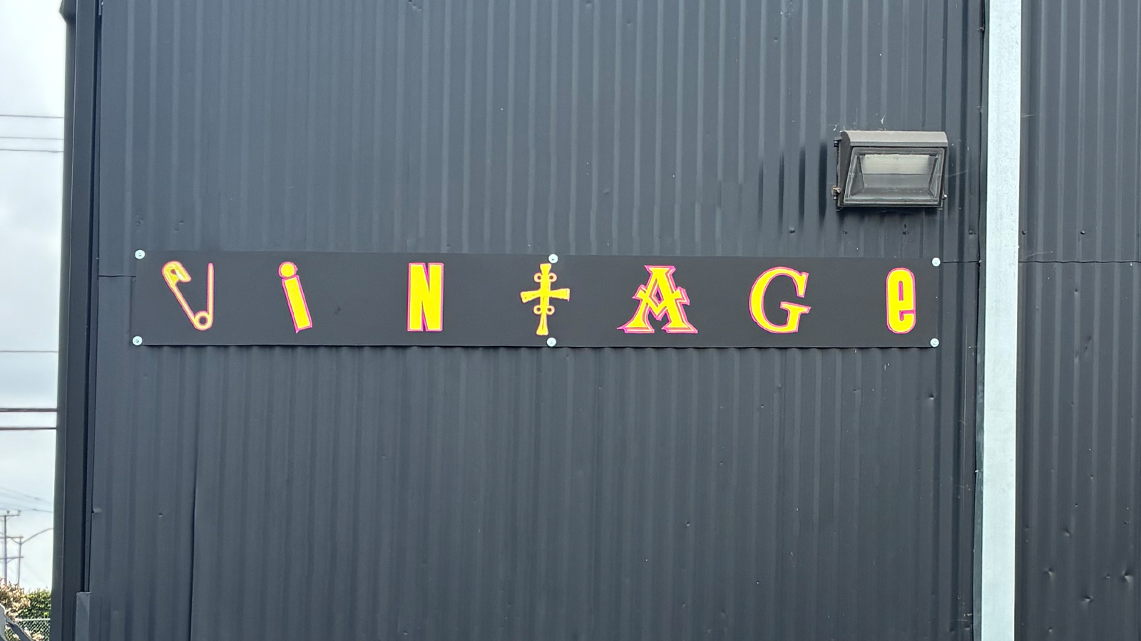 vintage vortex printed dibond signs on metal wall